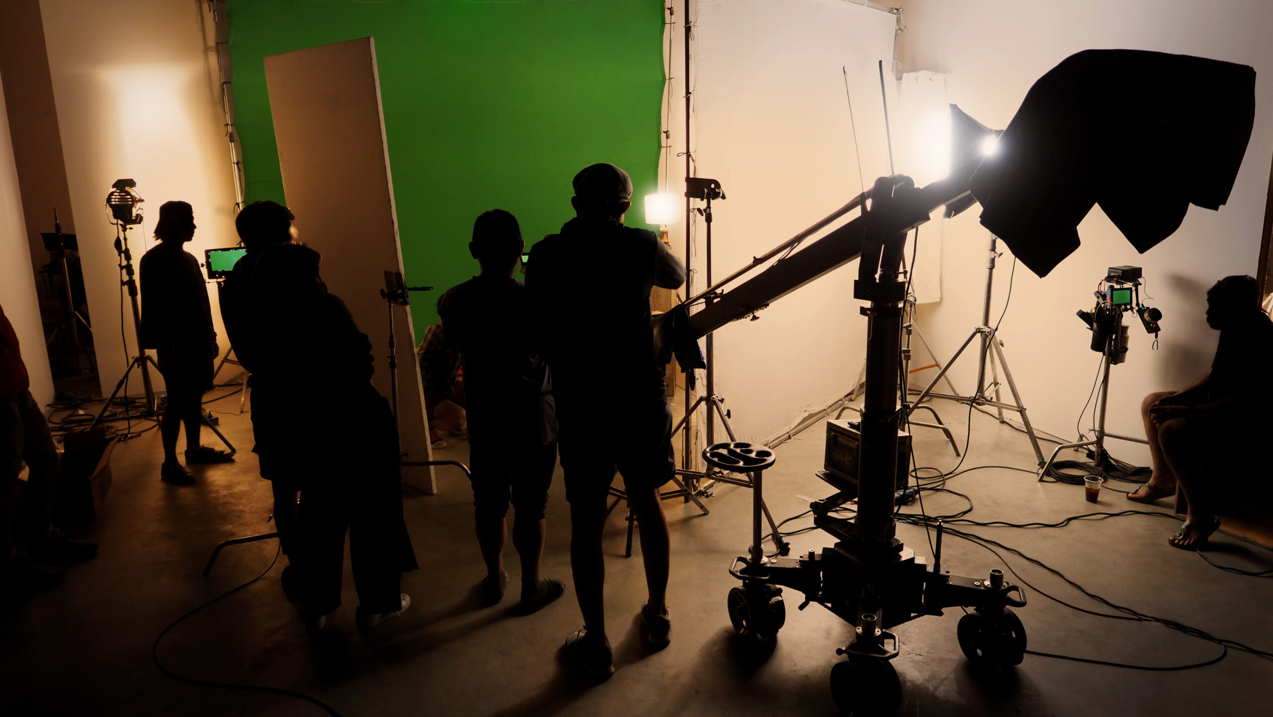 Silhouette images of making of or behind the scenes of video pro