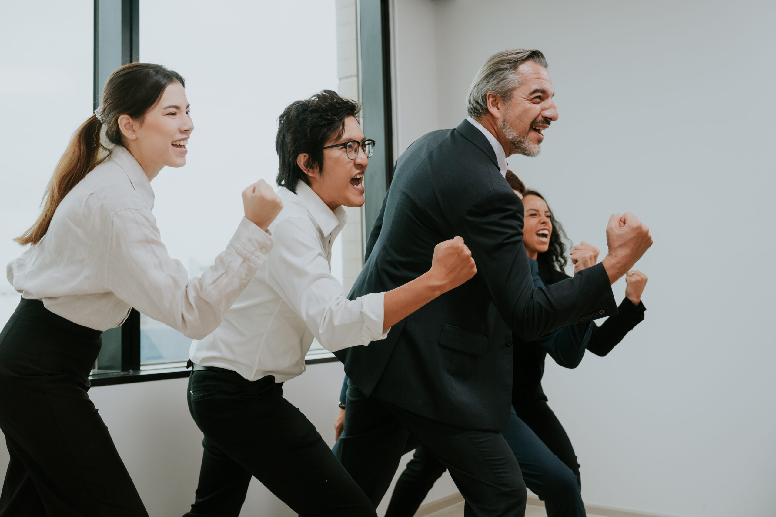 Successful entrepreneurs and business people group achieving goals, happy corporate team